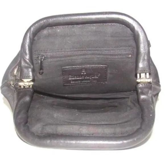 Etienne Aigner black logo design nylon and black leather, clutch or cosmetic bag with gold tone logo accents, a hinged opening