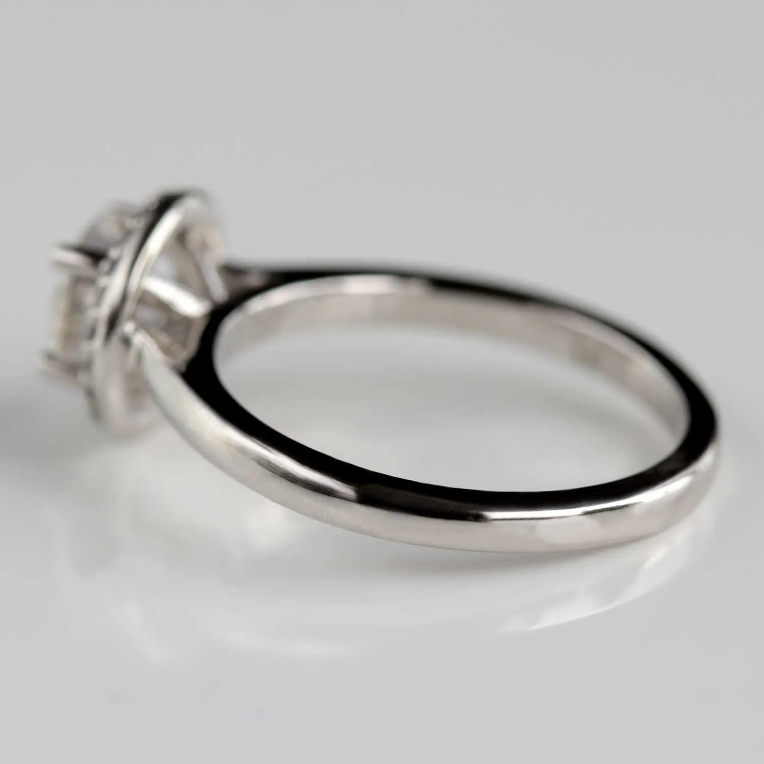 Prong-set Halo Solitaire Engagement Ring